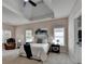 Spacious main bedroom with plush carpet, tray ceiling, and ensuite bathroom at 1635 Lake Heights Cir, Dacula, GA 30019