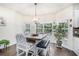 Eat-in kitchen dining area with many windows allowing natural light to the space at 223 Sterling Brook Ln, Canton, GA 30114