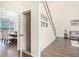 Inviting entry with hardwood floors and entry to the dining and living spaces at 223 Sterling Brook Ln, Canton, GA 30114