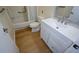 Renovated bathroom with new wood floors, sink and cabinets at 475 Mount Vernon Ne Hwy # C-220, Sandy Springs, GA 30328