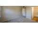 Large room, carpet, and access to the bathroom at 475 Mount Vernon Ne Hwy # C-220, Sandy Springs, GA 30328