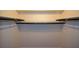 Walk in closet with rods and shelving at 475 Mount Vernon Ne Hwy # C-220, Sandy Springs, GA 30328