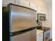 Kitchen with stainless steel appliances offers functionality and style at 475 Mount Vernon Ne Hwy # C-220, Sandy Springs, GA 30328