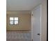 Spacious living room features neutral carpeting, and large window at 475 Mount Vernon Ne Hwy # C-220, Sandy Springs, GA 30328