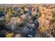 Aerial view of wooded neighborhood showcasing natural surroundings and mature trees at 4908 Mill Brook Dr, Atlanta, GA 30338