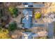 Overhead aerial of a well-maintained home with a long driveway and mature trees at 4908 Mill Brook Dr, Atlanta, GA 30338
