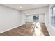 Finished basement showcasing modern flooring, recessed lighting, and a sliding glass door to the backyard at 4908 Mill Brook Dr, Atlanta, GA 30338
