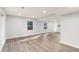 Spacious basement area with new flooring, recessed lighting, and windows for natural light at 4908 Mill Brook Dr, Atlanta, GA 30338