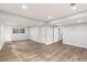 Spacious finished basement featuring new flooring, recessed lights, and open layout at 4908 Mill Brook Dr, Atlanta, GA 30338