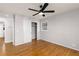 Bedroom featuring hardwood floors, closet with sliding doors, and neutral paint at 4908 Mill Brook Dr, Atlanta, GA 30338