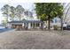 Charming single-story home with lovely front yard, attached garage and mature trees at 4908 Mill Brook Dr, Atlanta, GA 30338