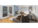 Cozy living room featuring a brick fireplace, built-in shelving, and a comfortable sectional sofa at 4908 Mill Brook Dr, Atlanta, GA 30338