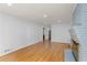 Light-filled living room with a fireplace, hardwood floors, and neutral decor at 4908 Mill Brook Dr, Atlanta, GA 30338