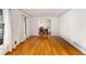 Bright living room with hardwood floors and large windows offering natural light at 4908 Mill Brook Dr, Atlanta, GA 30338