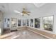 Bright sunroom featuring large windows and tile flooring, perfect for relaxing and enjoying natural light at 4908 Mill Brook Dr, Atlanta, GA 30338