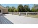 Large wooden deck with decorative railing, perfect for outdoor entertaining and relaxing at 5661 Rutland Trce, Lithonia, GA 30058