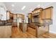 Spacious kitchen with custom wood cabinets, granite countertops, and stainless steel appliances at 5661 Rutland Trce, Lithonia, GA 30058