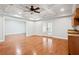 Living room featuring hardwood floors, recessed lights, and an open concept design at 5661 Rutland Trce, Lithonia, GA 30058