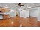 Spacious living room featuring hardwood floors, recessed lights, built in storage, and open design at 5661 Rutland Trce, Lithonia, GA 30058