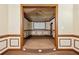 Entertainment space with tiered platform, carpeted flooring, screen, and detailed trim at 5661 Rutland Trce, Lithonia, GA 30058