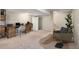 Basement office with neutral carpet, desk, shelves, and chair at 1378 Sheffield Glen Ne Way, Atlanta, GA 30329