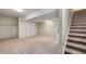 Finished basement with stairs, and carpet floors at 1378 Sheffield Glen Ne Way, Atlanta, GA 30329