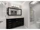 Modern bathroom with marble floors, elegant vanity, and glass enclosed shower at 1378 Sheffield Glen Ne Way, Atlanta, GA 30329