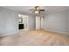 Spacious bedroom with a ceiling fan and neutral paint, next to a bright bathroom at 1378 Sheffield Glen Ne Way, Atlanta, GA 30329