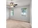 Bright bedroom with two windows and neutral carpeting at 1378 Sheffield Glen Ne Way, Atlanta, GA 30329