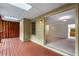 Outdoor deck featuring skylights and an entry into the spacious living room at 1378 Sheffield Glen Ne Way, Atlanta, GA 30329