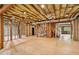 Expansive unfinished basement with exposed ceiling structure, ready for customization and offering ample potential for various uses at 145 Ardsley Ln, Alpharetta, GA 30005