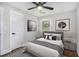 Cozy bedroom with stylish decor, wood floors, and a comfortable bed at 1934 Pinedale Pl, Decatur, GA 30032