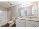 Bathroom featuring double sinks, granite counters, modern lighting and a shower-tub combination at 2183 Ramblewood Cir, Decatur, GA 30035