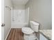 Bathroom featuring granite counters, modern lighting and a shower-tub combination at 2183 Ramblewood Cir, Decatur, GA 30035