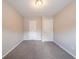 Bedroom with neutral carpet, white trim, and ample space for furnishings at 2183 Ramblewood Cir, Decatur, GA 30035