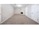 Inviting living room featuring a fireplace and neutral carpeting at 2183 Ramblewood Cir, Decatur, GA 30035