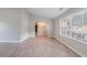 Bright living room with vaulted ceiling and large windows, showcasing modern design at 2183 Ramblewood Cir, Decatur, GA 30035