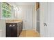 Bathroom with granite countertop, dark wood cabinets, and walk in shower at 3120 Beechwood Se Dr, Marietta, GA 30067