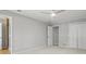 Bedroom with carpet, ceiling fan, closet, and doors to other rooms at 3120 Beechwood Se Dr, Marietta, GA 30067