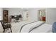 Bedroom with a desk, shelving unit and access to the ensuite bathroom at 3120 Beechwood Se Dr, Marietta, GA 30067