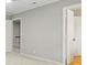 Carpeted bedroom with doors to other rooms and neutral gray walls at 3120 Beechwood Se Dr, Marietta, GA 30067