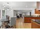 Charming breakfast nook features a modern chandelier and is located off the kitchen with hardwood flooring at 3120 Beechwood Se Dr, Marietta, GA 30067