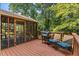 Spacious deck with a grill and outdoor seating, perfect for entertaining at 3120 Beechwood Se Dr, Marietta, GA 30067