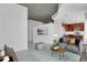 Cozy living room with open kitchen, modern decor, and ample natural light at 855 Peachtree Ne St # 2812, Atlanta, GA 30308