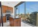 Gourmet kitchen featuring granite countertops and stunning city views at 855 Peachtree Ne St # 2912, Atlanta, GA 30308