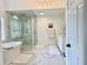 Luxurious bathroom with a soaking tub, frameless glass shower, and double vanity at 1813 Baldwin Farms Dr, Marietta, GA 30068