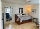 Bedroom offers hardwood floors, lots of natural light, and open access to an office space at 1813 Baldwin Farms Dr, Marietta, GA 30068
