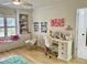 Bright bedroom features a desk area, large window with seat, and decor art on the walls at 1813 Baldwin Farms Dr, Marietta, GA 30068