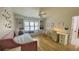 Cozy bedroom with a daybed, a built-in window seat, decorative shelves, and plenty of natural light at 1813 Baldwin Farms Dr, Marietta, GA 30068