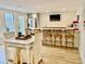 Entertaining game room with chess table, bar seating, and a large television at 1813 Baldwin Farms Dr, Marietta, GA 30068